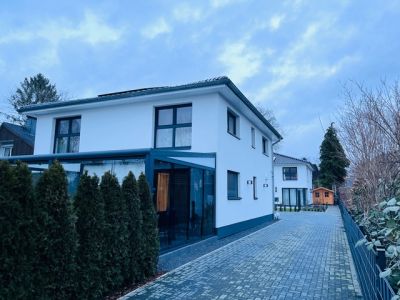 Neubau von zwei Einfamilienhäusern im Toscana Stil