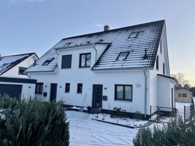Neubau eines Doppelhauses auf einem rückwertigen Grundstück